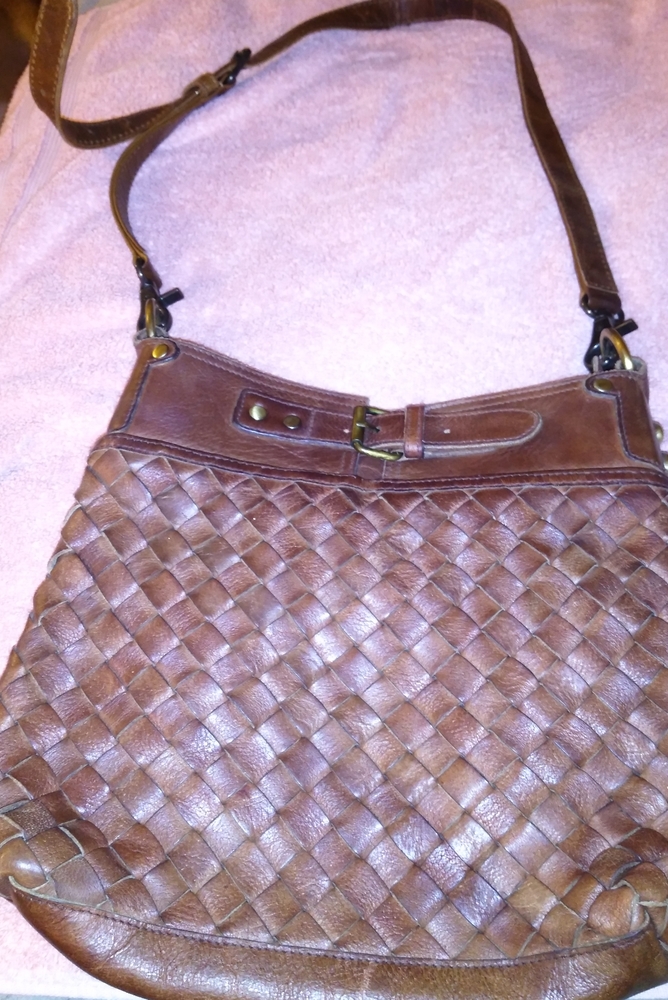Cute brown Mo & Co purse